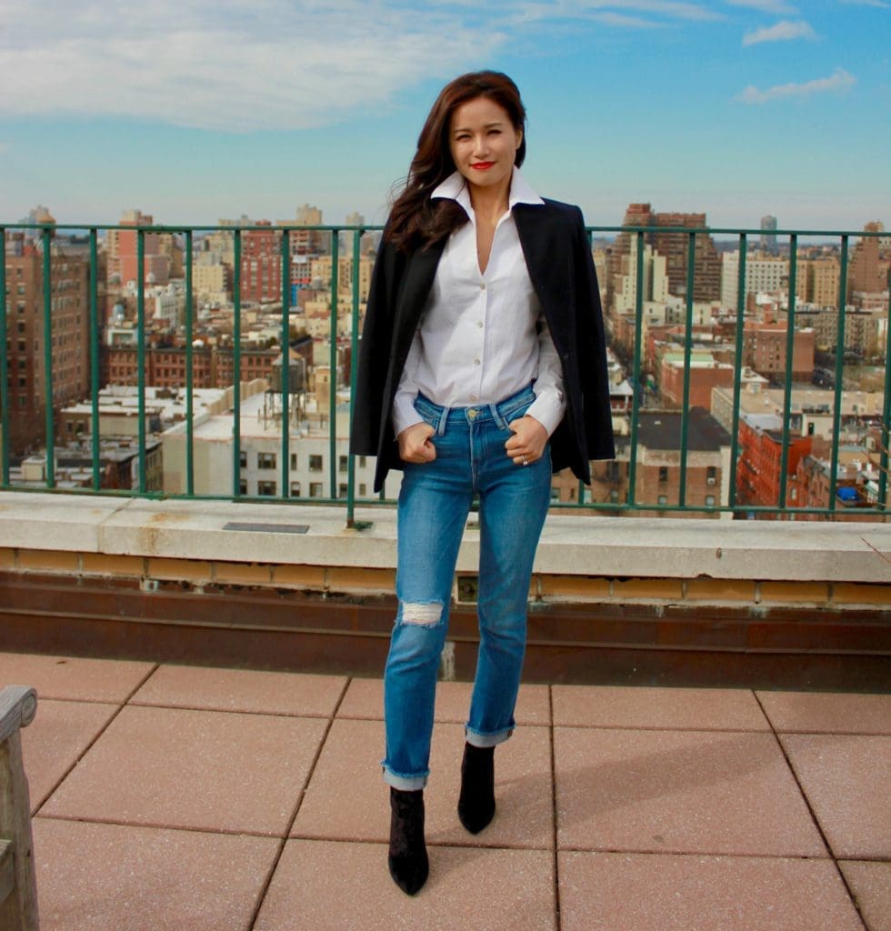 fashion stylist Jinhye Edwards models a white button down shirt and black blazer