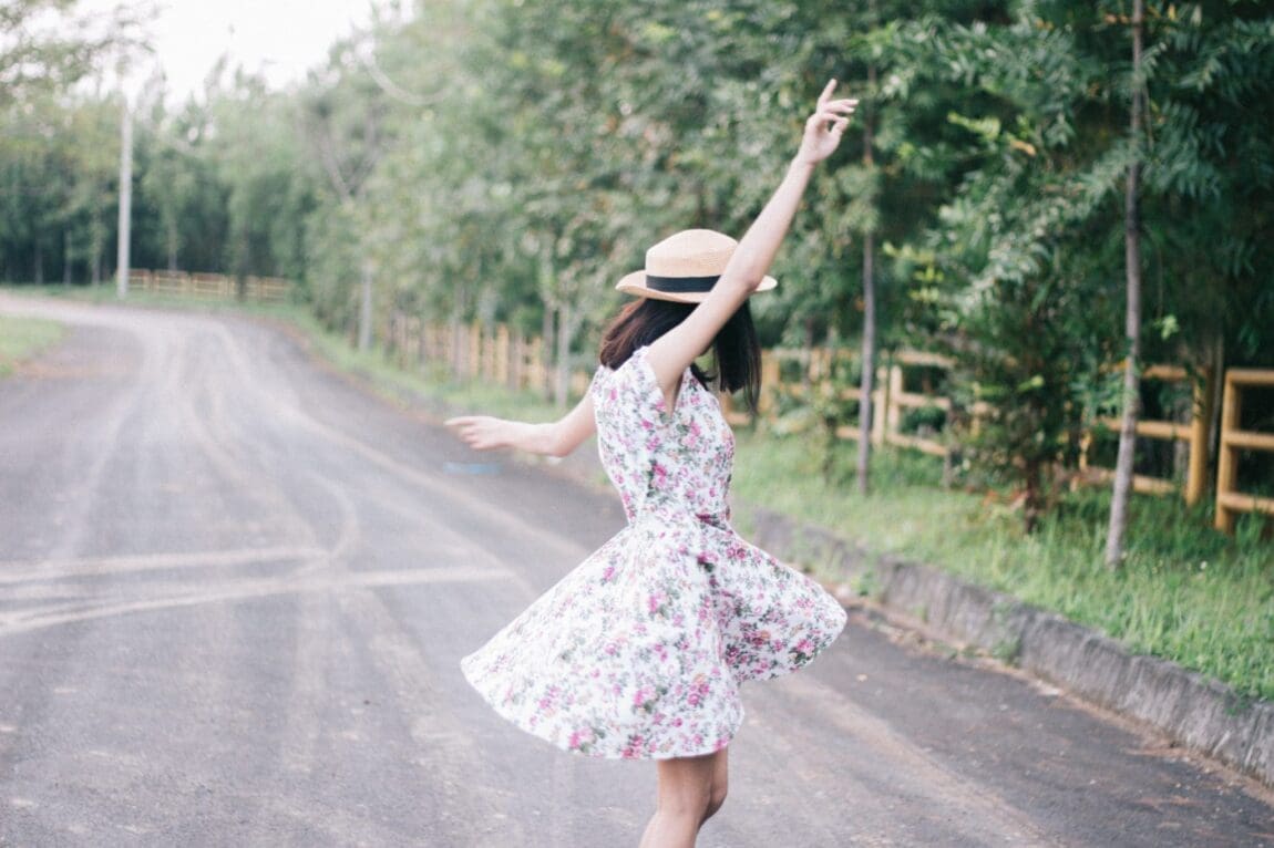 a woman dancing in the street