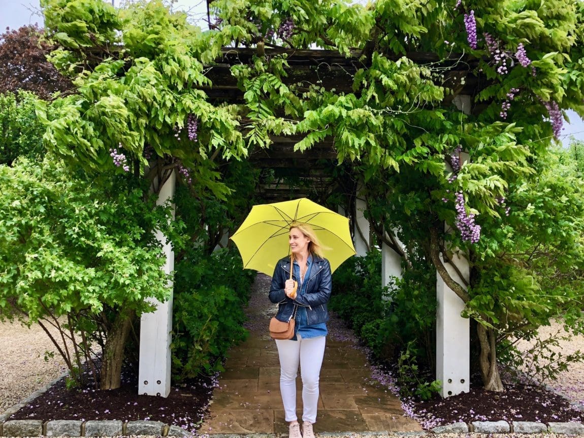 Merry Lerner posing with a yellow umbrella